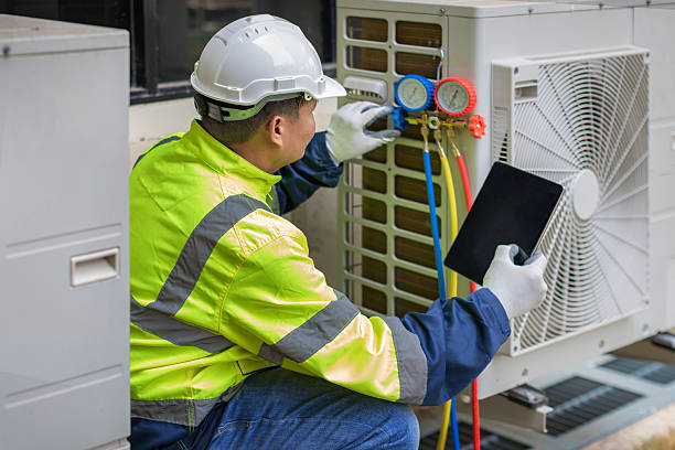 Professional Hvac technician working in Rainier, WA